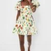 Exclusive Ivory Floral Caramelo Mini Dress